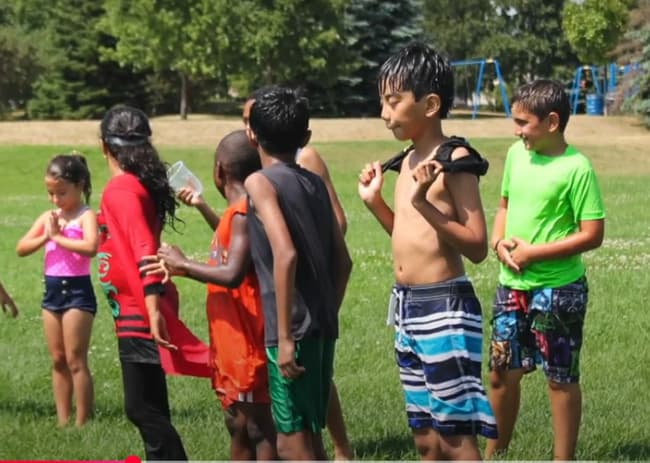 Campers cooling off during a water activity